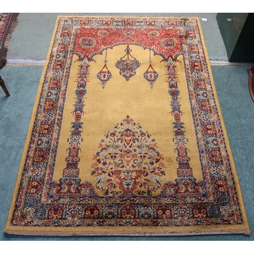 65 - A 20th century yellow ground Kayseri rug with multicoloured border, 200cm long x 134cm wide