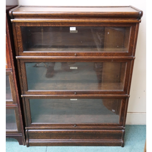 71 - An early 20th century oak Globe Wernicke three tier sectional bookcase, 119cm high x 87cm wide x 27c... 