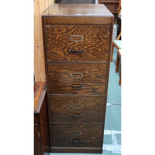 76 - A 20th century oak four drawer filing cabinet, 131cm high x 51cm wide x 64cm deep