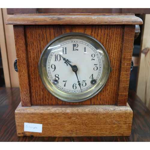 77 - A 20th century mahogany cased Vienna style wall clock and an oak cased mantle clock (2)