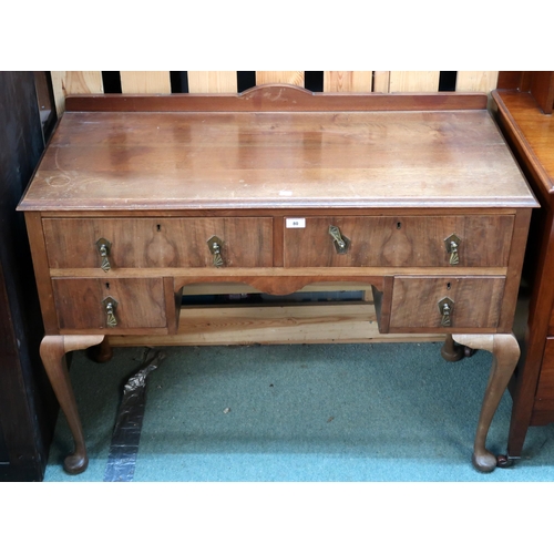 80 - A 20th century mahogany and walnut veneered dressing table