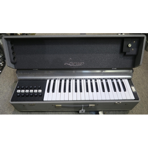 548A - A portable Lorezo electronic chord organ