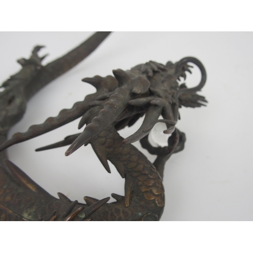 211 - A JAPANESE BRONZE MODELL OF A DRAGON
