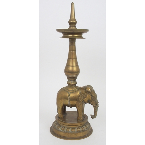 214 - AN INDIAN BRASS ELEPHANT PRICKET CANDLESTICK