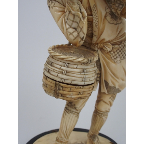 228 - A JAPANESE SECTIONAL CARVED IVORY FIGURE