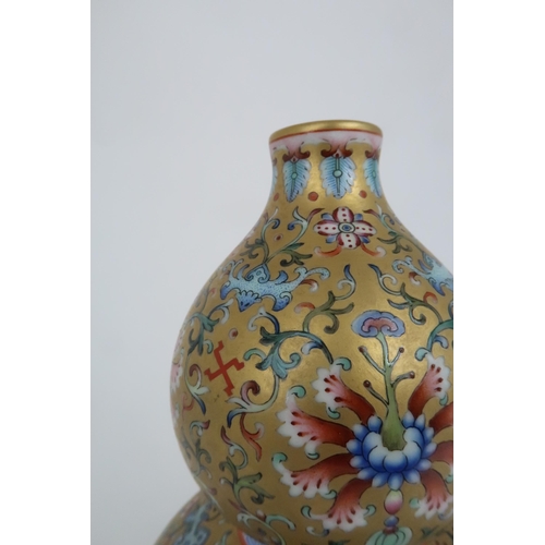 245 - A CHINESE GOLD GROUND DOUBLE GOURD VASE