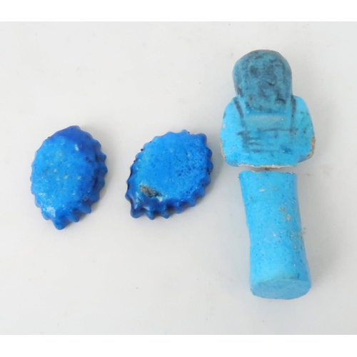 266 - AN EGYPTIAN BLUE GLAZED SHABTI