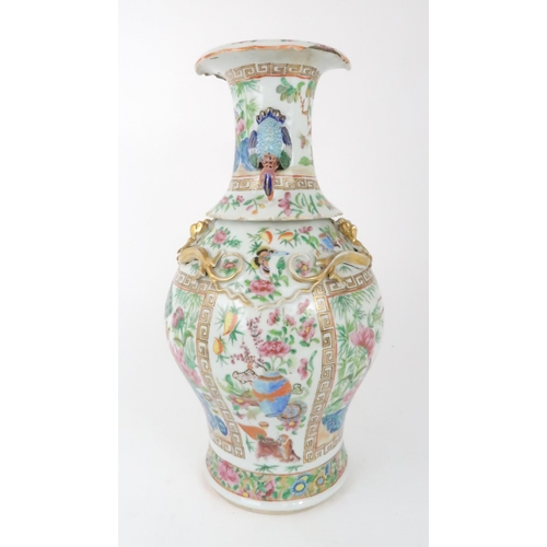 268 - A CANTON BALUSTER VASE