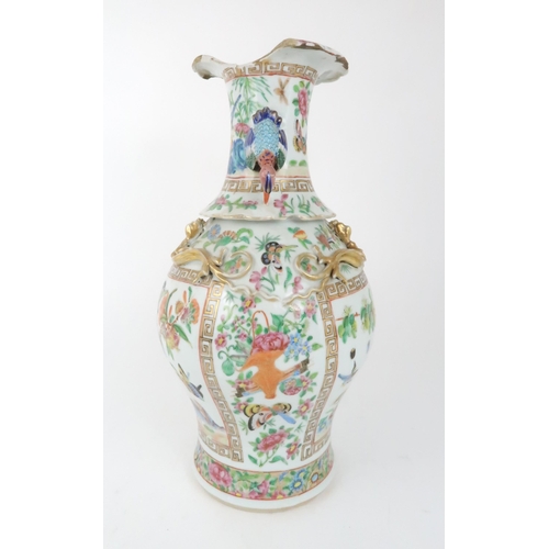 268 - A CANTON BALUSTER VASE