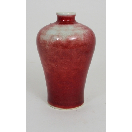 286 - A CHINESE RED GROUND BALUSTER VASE