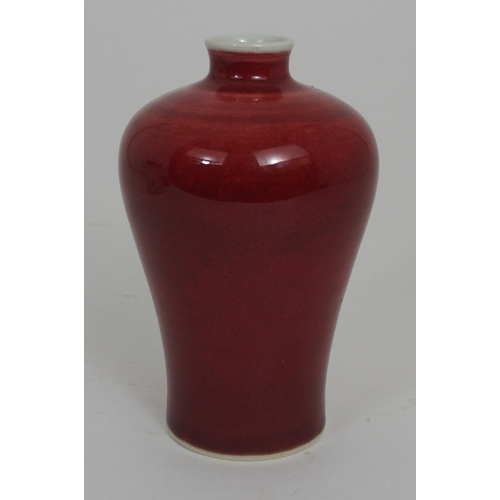 286 - A CHINESE RED GROUND BALUSTER VASE