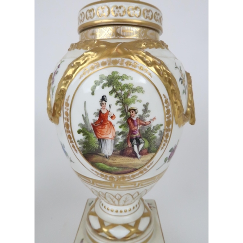 328 - A GERMAN PORCELAIN URN