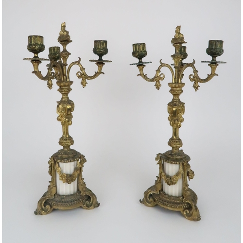 336 - A PAIR OF GILT METAL AND ALABASTER CANDELABRA