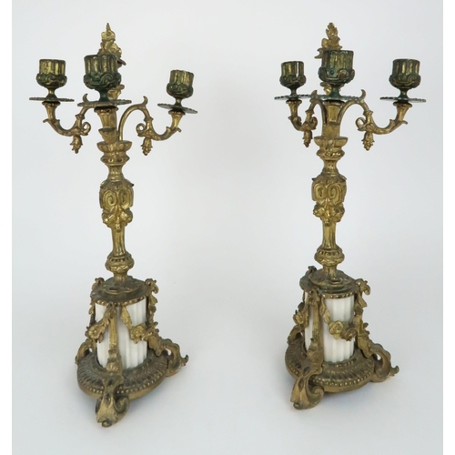 336 - A PAIR OF GILT METAL AND ALABASTER CANDELABRA