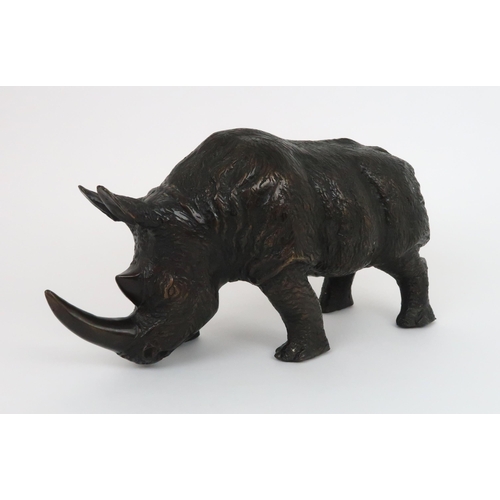 348 - A BRONZE OF A RHINO