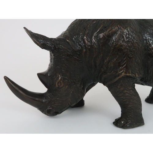 348 - A BRONZE OF A RHINO