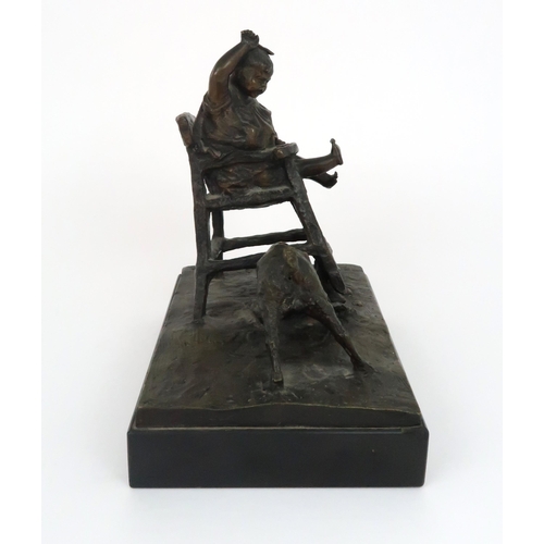 349 - A BRONZE OF A CHILD IN HIGH CHAIR