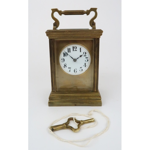 359 - A FRENCH GILT BRASS CHIMING CARRIAGE CLOCK