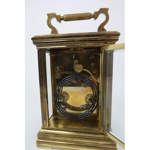 359 - A FRENCH GILT BRASS CHIMING CARRIAGE CLOCK