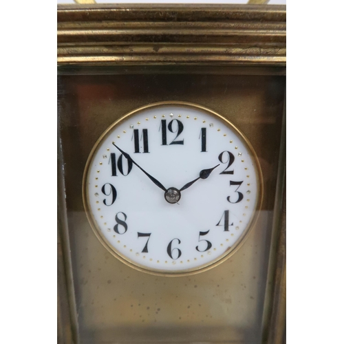 359 - A FRENCH GILT BRASS CHIMING CARRIAGE CLOCK