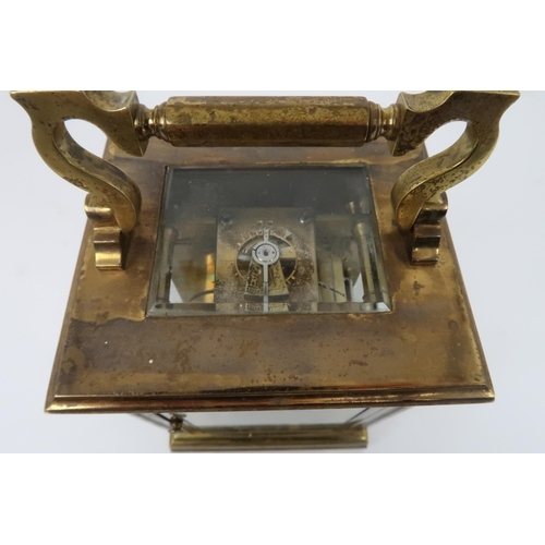 359 - A FRENCH GILT BRASS CHIMING CARRIAGE CLOCK