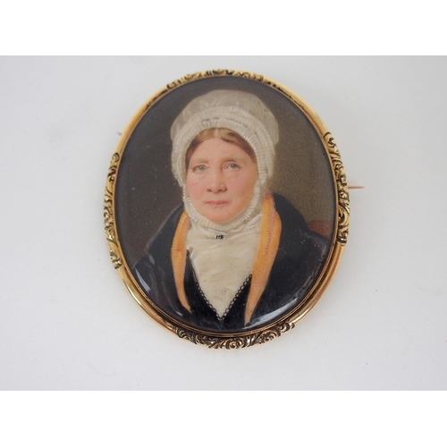 487 - A PAINTED PORTRAIT MINIATURE OF A LADY