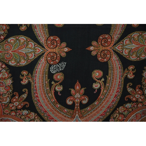 522 - A VICTORIAN RED GROUND PAISLEY SHAWL