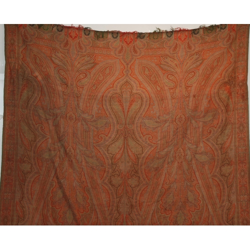 522 - A VICTORIAN RED GROUND PAISLEY SHAWL