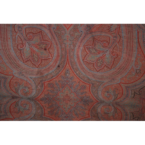 522 - A VICTORIAN RED GROUND PAISLEY SHAWL