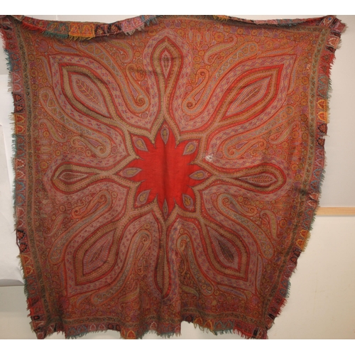 523 - A VICTORIAN RED GROUND PAISLEY SHAWL