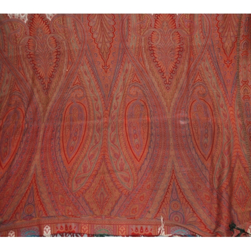 523 - A VICTORIAN RED GROUND PAISLEY SHAWL