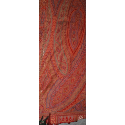 523 - A VICTORIAN RED GROUND PAISLEY SHAWL