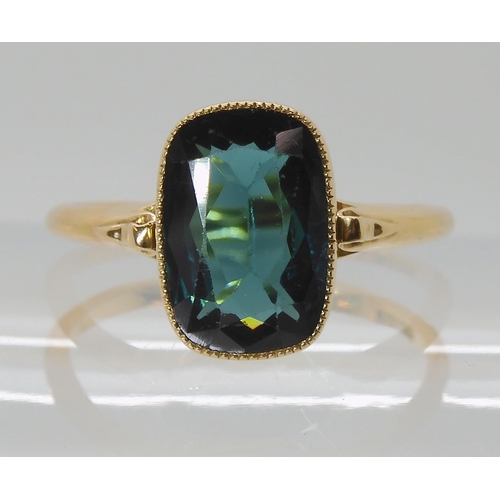 706 - A TEAL COLOURED TOURMALINE RING