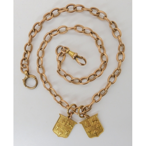 709 - AN 18CT GOLD FOB CHAIN WITH TWO ETON SCHOOL MEDALLIONS