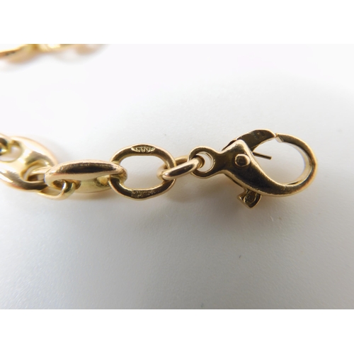 711 - A 14K GOLD ANCHOR CHAIN NECKLACE