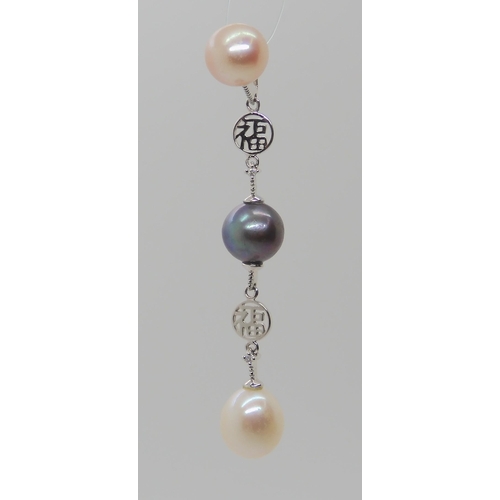 804 - A 14K CHINESE SYMBOL  DIAMOND AND PEARL PENDANT