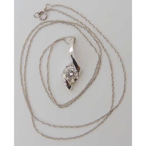 808 - A 14K WHITE GOLD DIAMOND PENDANT AND CHAIN