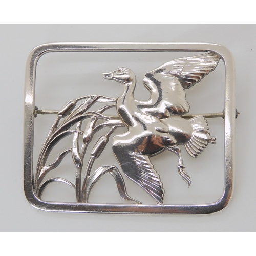 813 - A SILVER GEORG JENSEN FLYING DUCK BROOCH