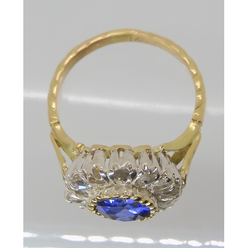 814 - AN 18CT GOLD ROSE CUT DIAMOND AND BLUE GEM SET RING