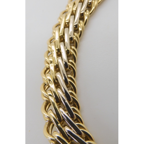 817 - AN ITALIAN MADE 18CT BI COLOUR GOLD BRACELET