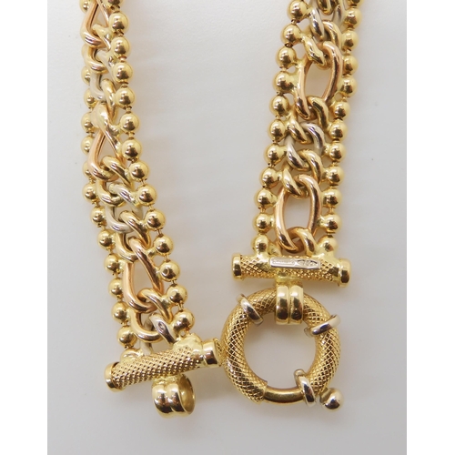 818 - AN 18CT GOLD ITALIAN MADE FIGARO AND BALL LINK BRACELET