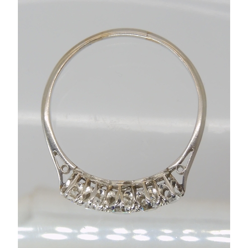 824 - A WHITE METAL FIVE STONE DIAMOND RING