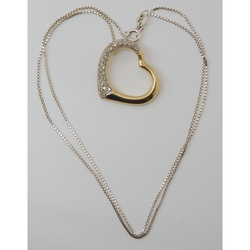 826 - A 9CT GOLD DIAMOND SET HEART PENDANT