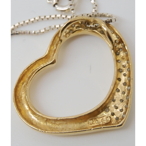 826 - A 9CT GOLD DIAMOND SET HEART PENDANT