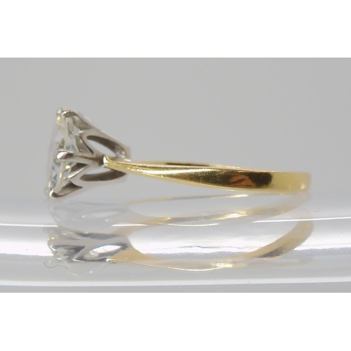 831 - AN 18CT GOLD DIAMOND SOLITAIRE RING