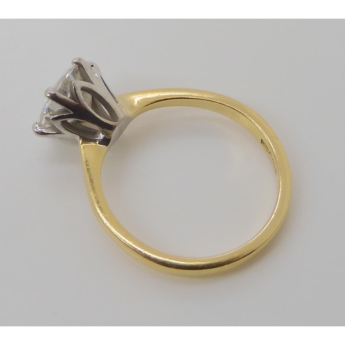 831 - AN 18CT GOLD DIAMOND SOLITAIRE RING