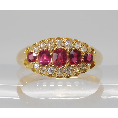 832 - AN 18CT GOLD RUBY AND DIAMOND RING