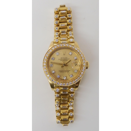 872 - AN 18CT GOLD LADIES ROLEX OYSTER PERPETUAL DATE JUST