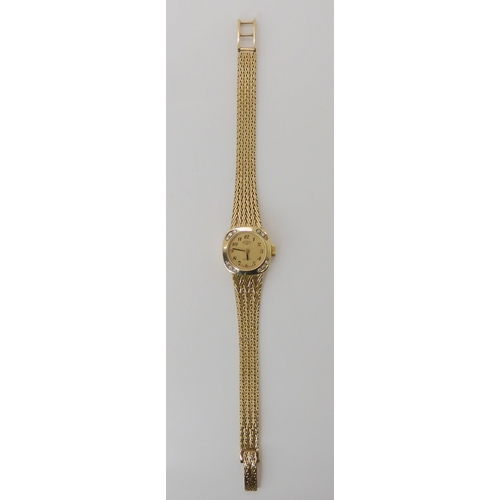 880A - A 9CT GOLD LADIES DIAMOND SET ROTARY WATCH