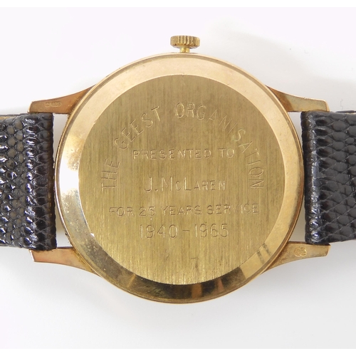 894 - A 9CT GOLD GARRARD QUARTZ WATCH